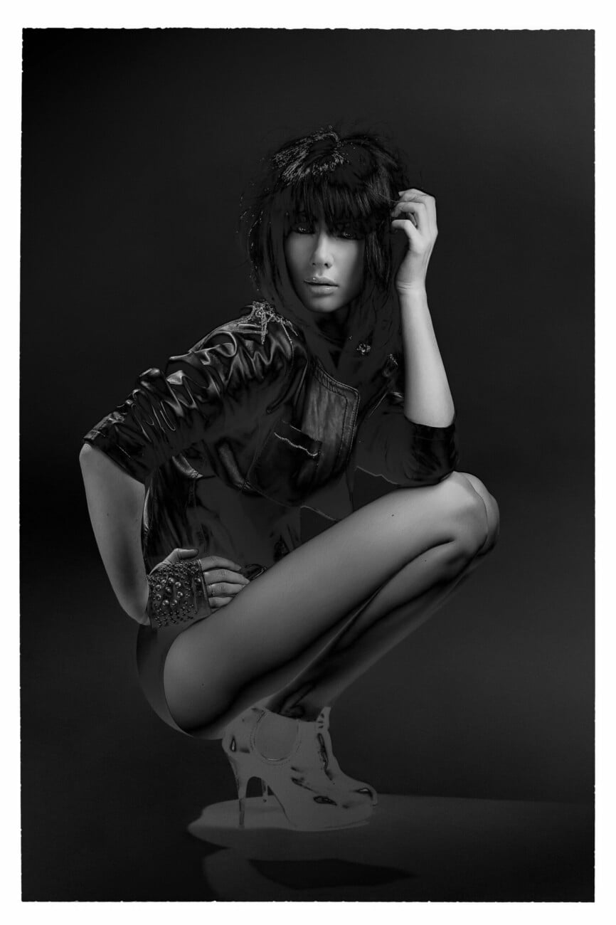 Black and white fashion photograph of model Masha Alexandra Obolensky from the 'Masha Alexandra Obolensky' series by photographer Étienne Delorme – image 02