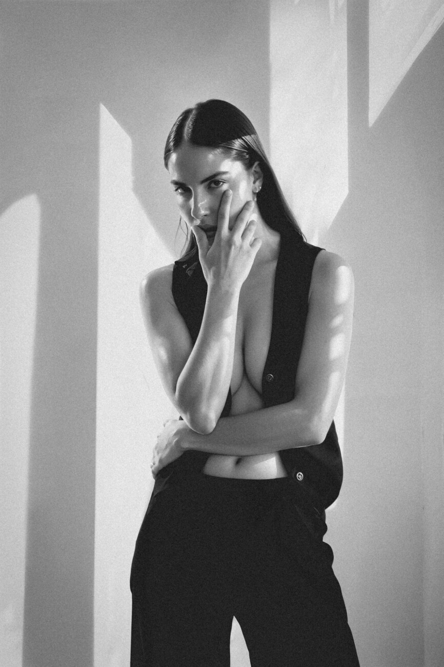 Black and white fashion photograph of model Rébecca Bagnol from the 'Rebecca Bagnol – Shadows' series by photographer Étienne Delorme – image 01