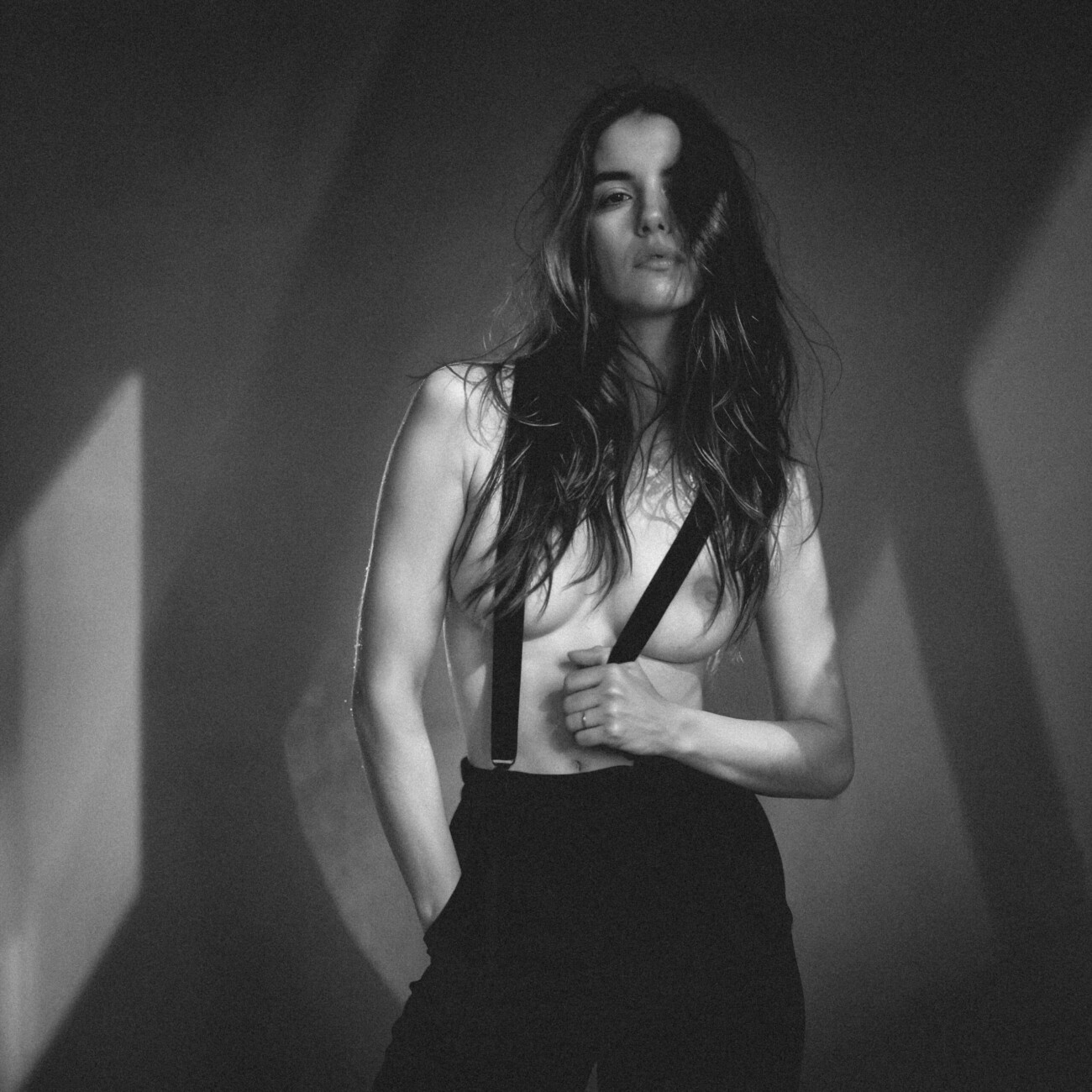 Black and white fashion photograph of model Rébecca Bagnol from the 'Rebecca Bagnol – Shadows' series by photographer Étienne Delorme – image 02